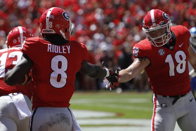 Georgia wide receiver Riley Ridley , left, was picked in the fourth round by the Bears while tight end Isaac Nauta was taken in the seventh round by the Lions during the NFL draft. [Photo/Joshua L. Jones, Athens Banner-Herald]