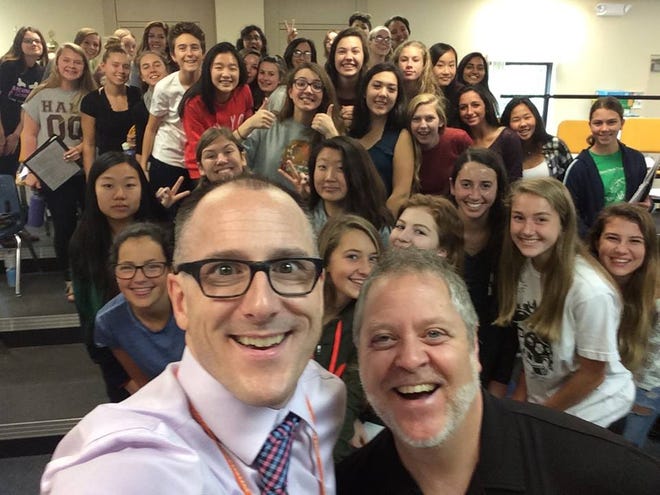 Key Chorale Artistic Director Joseph Caulkins, front right, with Seth Gardner and students from the Pine View School choir in 2018. [Provided by Key Chorale]