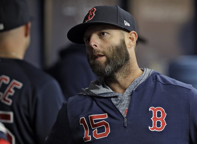 Dustin Pedroia, pictured talking to a teammate before a baseball game against the Tampa Bay Rays on April 19, will start a rehab assignment with Double-A Portland at some point this week. [AP File Photo/Chris O'Meara]
