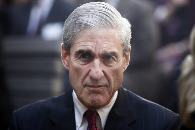 WASHINGTON -- Special Counsel Robert Mueller's report on his investigation into Russian meddling in U.S. elections is a road map to possible obstruction of justice by President Donald Trump. [AP Photo/Charles Dharapak]