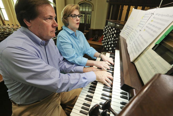 Raymond and Elizabeth Chenault practice for their presentation at First Presbyterian Church in Tuscaloosa Friday, April 26, 2019. The Chenaults Organ Duo will perform on the pipe organ at First Presbyterian at 4 p.m. Sunday, April 28. [Staff Photo/Gary Cosby Jr.]