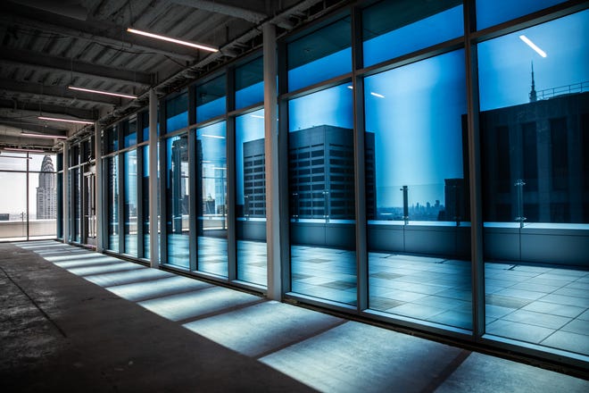 Smart windows made by View darken as the sun becomes brighter at a building in Midtown Manhattan, April 3, 2019. Office developers and landlords are being driven to provide telecommunications infrastructure and add sophisticated technology like smart windows to better compete in the marketplace. [Jeenah Moon / The New York Times]