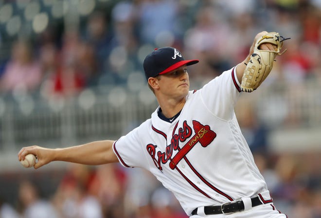 Braves starting pitcher Mike Soroka works against the San Diego Padres in the first inning on Monday in Atlanta. [JOHN BAZEMORE/THE ASSOCIATED PRESS]