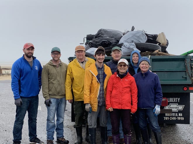 Volunteers and town employees gathered to clear trash from local beaches. Pictured from left are Jake Congel, Andrew Bagnara, Bob Cook, Kosta Cassavan, Bill Allan, Joanna Buffington, Ann Allan and Carol Spokes. [COURTESY PHOTO EASTHAM CONSERVATION FOUNDATION]