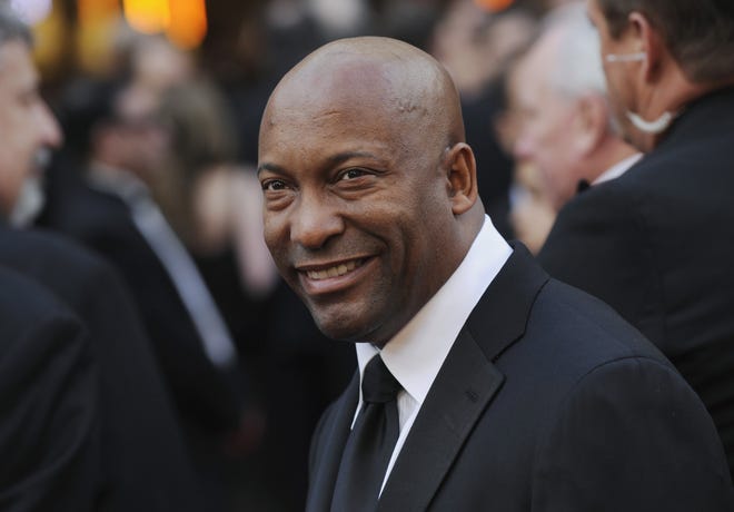 Director John Singleton arrives at the 80th Academy Awards in Los Angeles in 2008. Oscar-nominated filmmaker John Singleton has died at 51 after suffering a stroke almost two weeks ago. (AP Photo/Chris Pizzello, File)