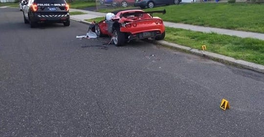 This photo from Tullytown police shows the unoccupied Lotus sports car that was damaged early Saturday after a police cruiser on patrol struck it. [COURTESY OF TULLYTOWN POLICE FACEBOOK PAGE]