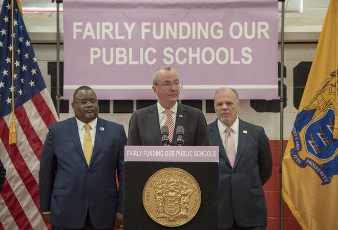 Gov. Phil Murphy delivers remarks before signing legislation to make changes to the state's school funding law last year. Also speaking during the ceremony were Department of Education Commissioner Lamont Repollet and Senate President Stephen Sweeney, D-3rd of West Deptford. [FILE]