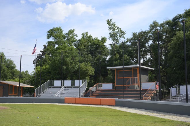 D&D Village Construction donated the materials and labor to Mount Dora High School for a new $12,000 backstop at Hein Field. [Cindy Sharp/Correspondent]