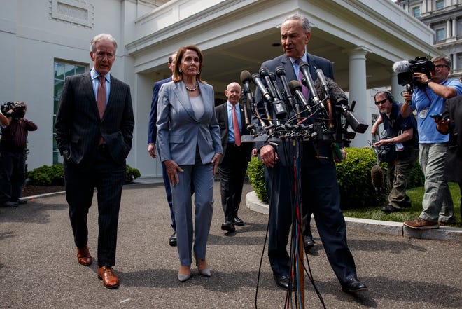 Speaker of the House Nancy Pelosi of Calif., and Senate Minority Leader Sen. Chuck Schumer of N.Y., walk over to speak with reporters after meeting with President Donald Trump about infrastructure, at the White House, Tuesday, April 30, 2019, in Washington. From left, House Ways and Mean Committee Chairman Rep. Richard Neal, D-Mass., Sen. Ron Wyden, D-Ore., Pelosi, Chairman of the House Transportation and Infrastructure Committee Rep. Peter DeFazio, D-Ore., and Schumer. (AP Photo/Evan Vucci)