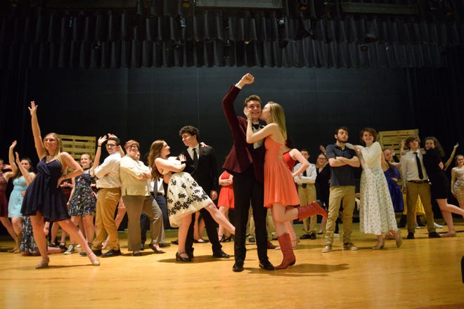 The cast of Dartmouth High Theatre Company’s production of ‘Footloose’ rehearse a dance sequence in preparation for this weekend’s run. [Submitted photos]