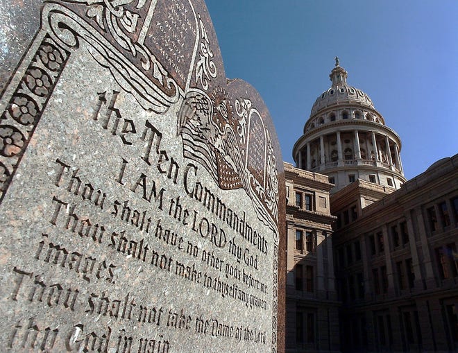 A tablet of the Ten Commandments located on the grounds of the Texas Capitol Building, as seen in this 2004 file photo. [AP PHOTO/AMERICAN STATESMAN/LARRY KOLVOORD]