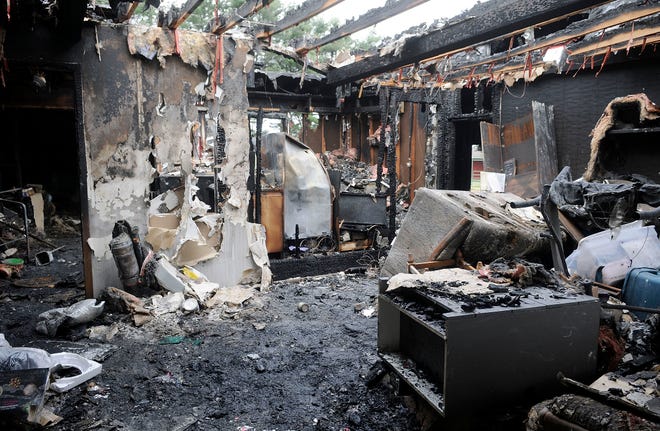 A view through the front door of the Telego's home on CR 1754 is shown Wednesday, May 1, 2019 after the Tuesday evening fire that destroyed the home. Tom E. Puskar, Times-Gazette.com