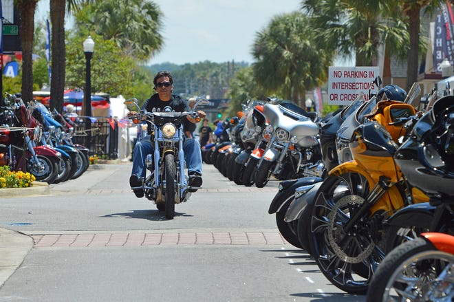 Motorcycles line Main Street on Friday during the 2019 Leesburg Bikefest. [Whitney Lehnecker/Daily Commercial]