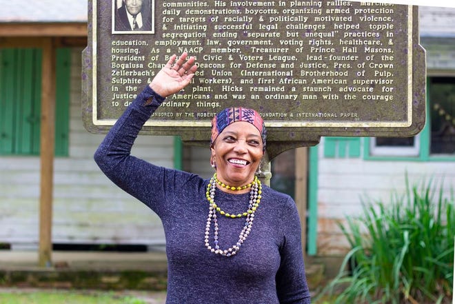 Barbara Hicks-Collins stands in front of her father's historic house, which she would like to turn into a museum.