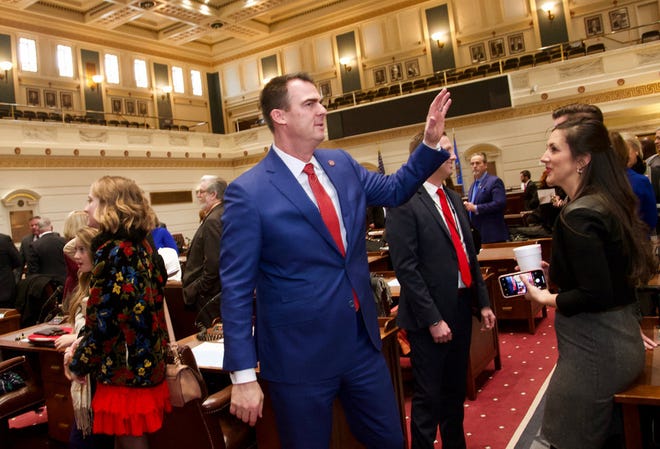 Gov. elect Kevin Stitt waves to members on the senate floor before the inauguration ceremony of new Oklahoma Gov. Kevin Stitt at the Oklahoma State Capitol in Oklahoma City, Okla. on Monday, Jan. 14, 2019. Photo by Chris Landsberger, The Oklahoma