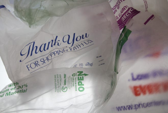 Providence's newly enacted ban on plastic checkout bags will take effect in six months. [The Providence Journal, file / Sandor Bodo]