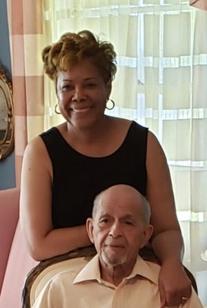 Charles S. Chestnut III, seated, and his wife, Cynthia Chestnut, standing, will be honored with the Legacy Award at the 9th annual GRU Brighter Tomorrow Scholarship Banquet May 9 at the Hilton UF Conference Center. [SUBMITTED PHOTO]