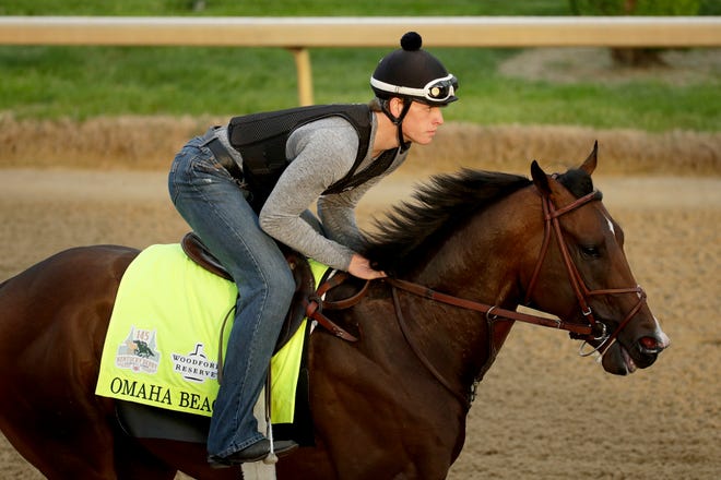 Exercise rider Taylor Cambra rides Kentucky Derby entrant Omaha Beach during a workout at Churchill Downs Wednesday, May 1, 2019, in Louisville, Ky. The 145th running of the Kentucky Derby is scheduled for Saturday, May 4. (AP Photo/Charlie Riedel)