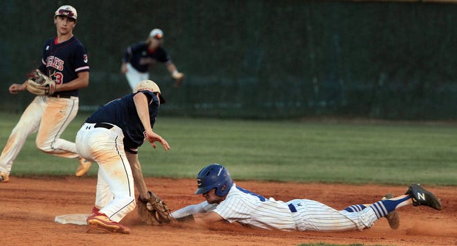 Lincoln Charter's John Burns tags out Cherryville's Levi Kiser as he attempted to steal second base as Cherryville High School hosted Lincoln Charter in the Southern Piedmont 1A Conference tournament championships Thursday evening, May 2, 2019. [Mike Hensdill/The Gaston Gazette]