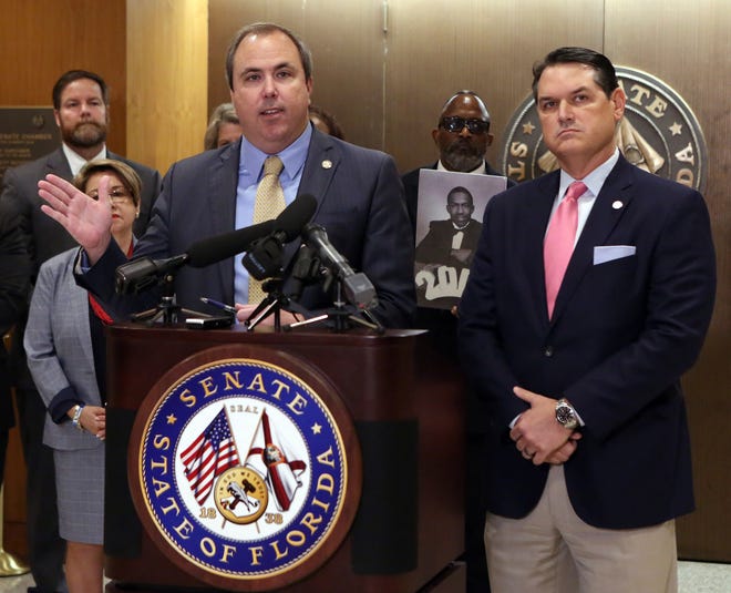 State Sen. Joe Gruters, R-Sarasota, left, along with Rep. Cord Byrd, R-Neptune Beach, speak about a sanctuary bill they sponsored during a news conference on April 17 in Tallahassee. The Legislature passed the sanctuary bill Thursday and sent it to Gov. Ron DeSantis for approval. [AP Photo / Steve Cannon]
