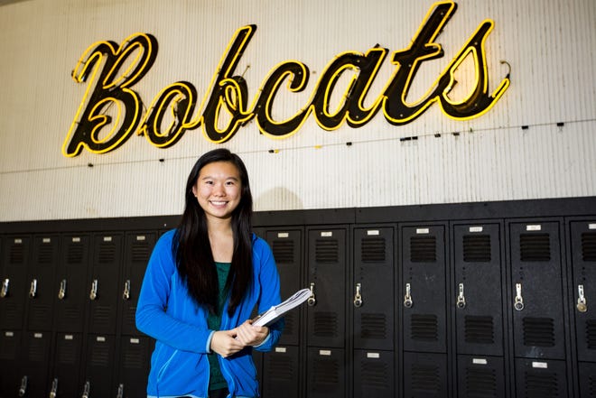 Helena Jiang, who recently was named a Sunshine State Scholar, poses for a portrait at Buchholz High School on May 1. One of the state's top science students, she'd like to help close racial and gender disparity gaps in the science and technology arenas. [Lauren Bacho/Staff Photographer]