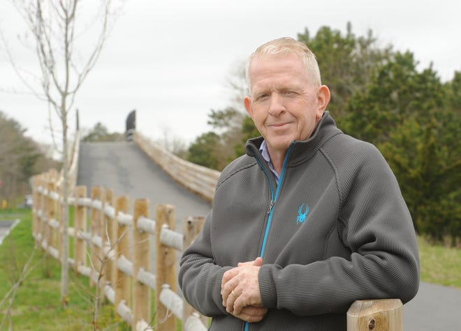 Officials are rallying around Brian Carey, a longtime education advocate and member of the Dennis-Yarmouth Regional School Committee who has been diagnosed with colon cancer. When he was first diagnosed, Carey said he decided he needed to get out and exercise more. He and his wife started walking and using the Cape Cod Rail Trail, a portion of which passes over Route 134 in South Dennis. [Merrily Cassidy/Cape Cod Times]