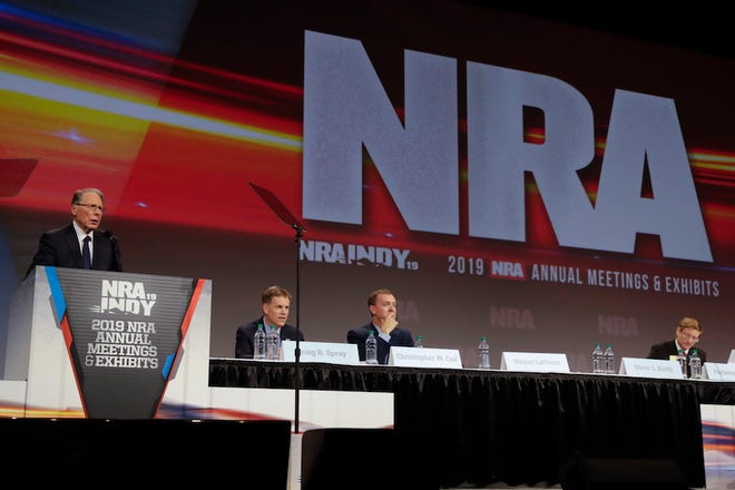 Nation Rifle Association Executive Vice President Wayne LaPierre speaks Saturday at the NRA annual meeting of members in Indianapolis. Retired Lt. Col. Oliver North has announced that he will not serve a second term as president of the NRA amid inner turmoil in the gun-rights group.