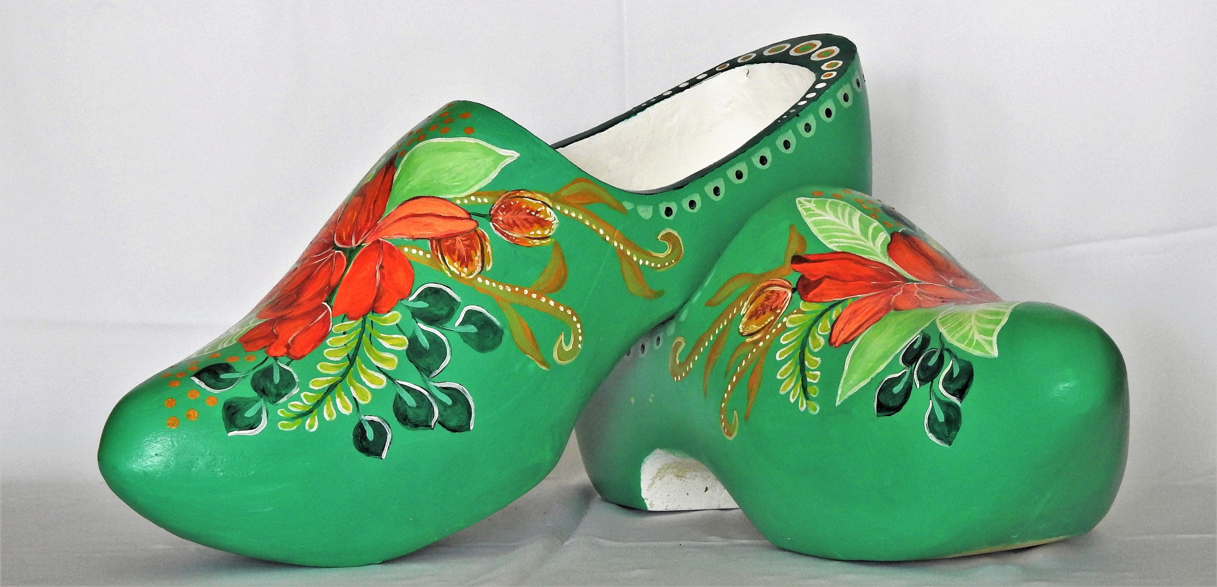 Klompen Pair of shoe art pieces recovered for Tulip Time