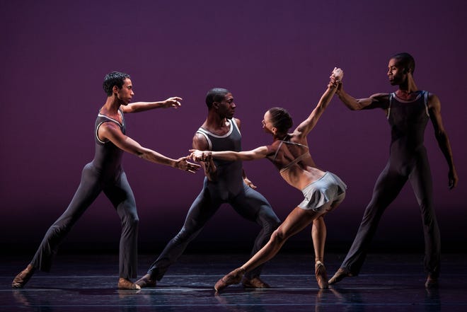 Dance Theatre of Harlem's Da'Von Doane, Chyrstyn Fentroy and Anthony Savoy perform in Robert Garland's "Return," which is set to a score that features Aretha Franklin and James Brown songs. The company will perform the work Wednesday at the Kravis Center. [PHOTO BY MATTHEW MURPHY]