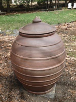 Pottery, by Stephen Procter, adds visual interest to a garden. [Henry Homeyer]