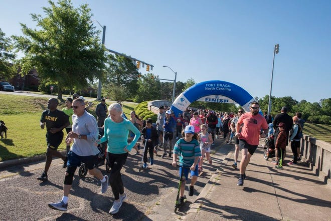 Participants toe the line at the start of the Fort Bragg Family Fun 5K Run and Walk, April 27. This Family friendly, free, non-competitive race series on-post, occurs once a month, between March and October.