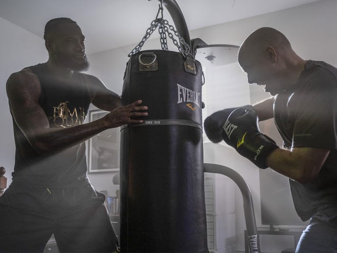 World Boxing Council heavyweight champ Deontay Wilder of Tuscaloosa plays himself in an episode of 'Billions' on Showtime that airs Sunday. Wilder, left, is shown with Kelly AuCoin, who plays "Dollar" Bill Stearn on the show. [Photo/Jeff Neumann/SHOWTIME]