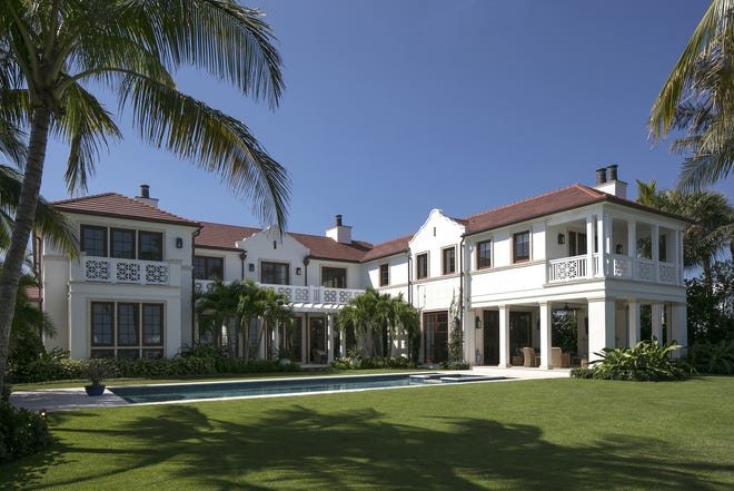 Completed in 2016, a house at 219 Indian Road facing the inlet at the north tip of Palm Beach sold in October for a recorded $28.63 million. [Photo by C.J. Walker, courtesy of the Frisbie Group]
