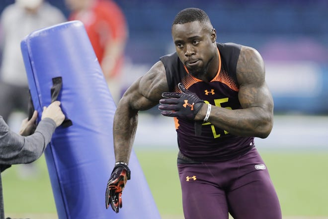 Former Texas linebacker Gary Johnson runs a drill during the NFL scouting combine March 3 in Indianapolis. Johnson is among the 17 undrafted rookies the Chiefs signed ahead of rookie camp, which kicked off Saturday. [March 2019 file photograph/The Associated Press]
