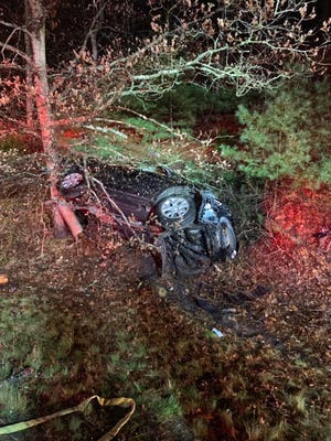 Dennis and Yarmouth crews worked to rescue a woman after her vehicle rolled over on Route 6 Sunday night.