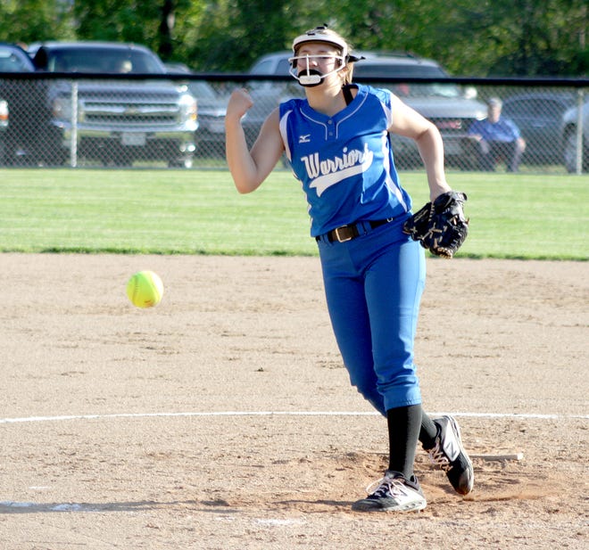 Buckeye Trail High's Sidney Beaver (8) delivers a pitch during Monday's Division III sectional tournament game against East Liverpool in Old Washington. Beaver had a five-inning perfect game as the Lady Warriors advanced with a 18-0 victory.