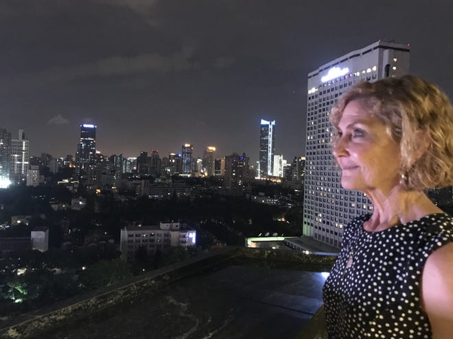 Diane Tomko, the teacher behind Flagler Palm Coast High School's wildly successful Community Problem Solving program, gazes upon the Shanghai City Center during a visit to China for a forum on creative problem solving and project-based learning last year. Tomko has announced that she is retiring this year [Photo provided]