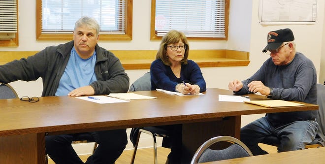 From left are Frankfort Power and Light Department Foreman Joseph Salvaggio, Village Treasurer Doreen Fiorentino and Codes Officer Butch Staffo during last week’s meeting of the Frankfort village board. A resident raised concerns about several matters related to the Hilltop Athletic Fields during the meeting. [DONNA THOMPSON/TIMES TELEGRAM]