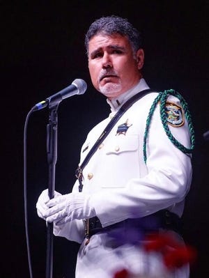 Reserve Deputy Artie Rodriguez, a local county music performer known for his original "If It Wasn't for the Badge," was selected to sing at the National Peace Officer's Memorial Service on May 15. [CONTRIBUTED PHOTO]