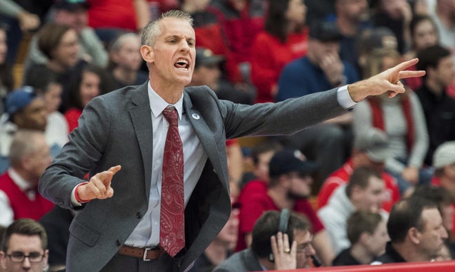 Gardner Webb coach Tim Craft sends in play against Radford during the first half of the Big South Conference Tournament championship game in Radford, Va. on March 10. [AP Photo/Lee Luther Jr.]