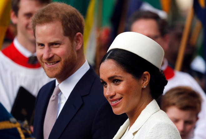 FILE - In this Monday, March 11, 2019 file photo, Britain's Prince Harry and Meghan, the Duchess of Sussex leave after the Commonwealth Service at Westminster Abbey in London. Buckingham Palace said Monday May 6, 2019, that Prince Harry's wife Meghan has gone into labor with their first child.(AP Photo/Frank Augstein, file)