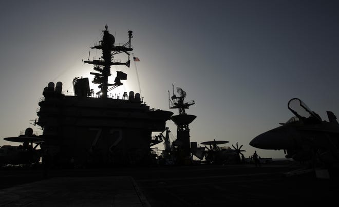 This photo shows the bridge of the Nimitz-class aircraft carrier USS Abraham Lincoln (CVN 72). The U.S. is dispatching the USS Abraham Lincoln and other military resources to the Middle East following "clear indications" that Iran and its proxy forces were preparing to possibly attack U.S. forces in the region, according to a defense official on May 5. [Hassan Ammar/AP Photo]