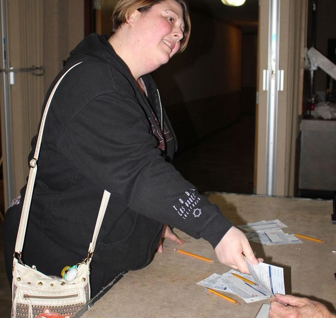 Rebecca Mulkey was among Sturgis voters who prepared to cast their ballots Tuesday. Voters approved a Sturgis Public Schools building and site sinking fund request by a vote of 591-509..