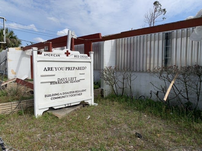 A sign outside the former Red Cross building in Panama City, which was destroyed by Hurricane Michael. [ERYN DION/THE NEWS HERALD]