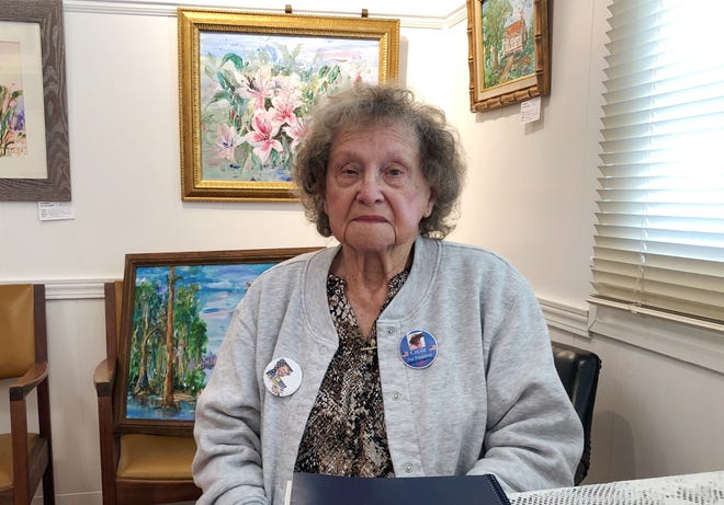 Cecile Evans, life member of the Terrebonne Fine Arts Guild, with a few of her paintings at the Downtown Art Gallery in Houma [Scott Yoshonis/Staff--houmatoday/dailycomet]