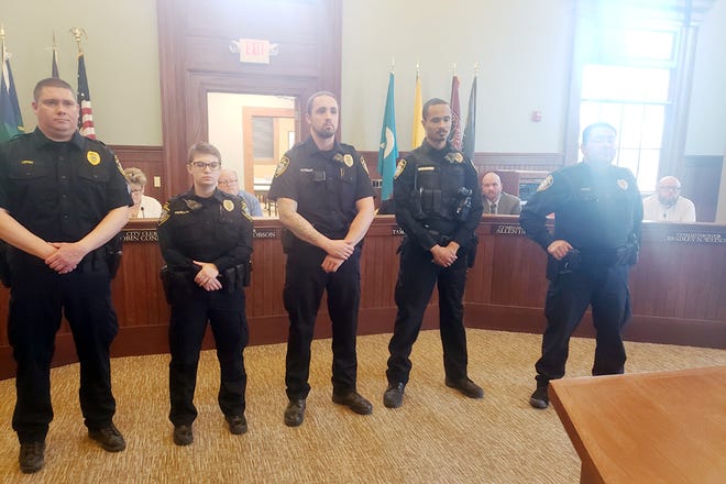 Members of the Adrian Police Department who were on scene of a barricaded gunman last week were honored at Monday’s City Commission meeting. Pictured, from left, are Lt. Jim Loffing, officer Michaela Merillat, Acting Sgt. Kevin Putnam, officer Adryan Robinson and officer Jeremy Powers. Not pictured: Sgt. Leslie Keane. Each were presented a plaque by Police Chief Vince Emrick.