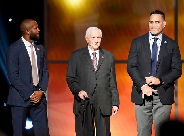 Kevin Mawae (right), set for induction this summer into the Pro Football Hall of Fame along with Champ Bailey (left) and Gil Brandt, has donated personal items from his playing career for the Hall’s Class of 2019 Locker Exhibit. (Paul Abell/Invision)