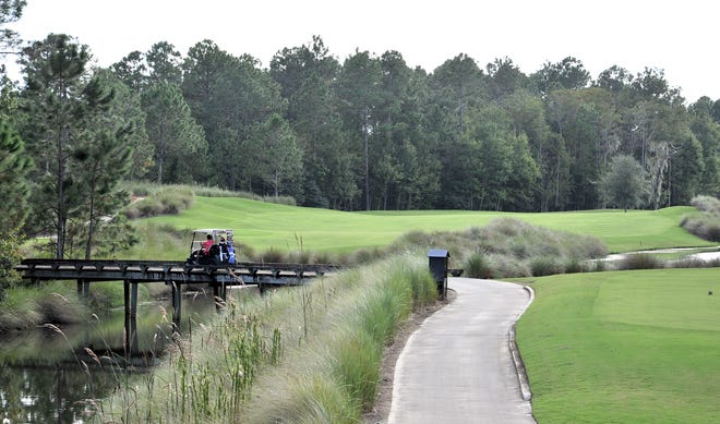 Golfers approach the fourth hole at the Slammer & Squire, a Bobby Weed-designed course. Weed will design a new 18-hole course in western St. Johns County. [Bruce Lipsky/Florida Times-Union/file]