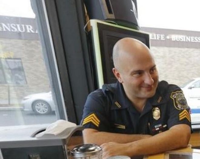 Sgt. Joshua Fernandes featured in Coffee with Cops event held in October 2018. [Standard-Times file photo]