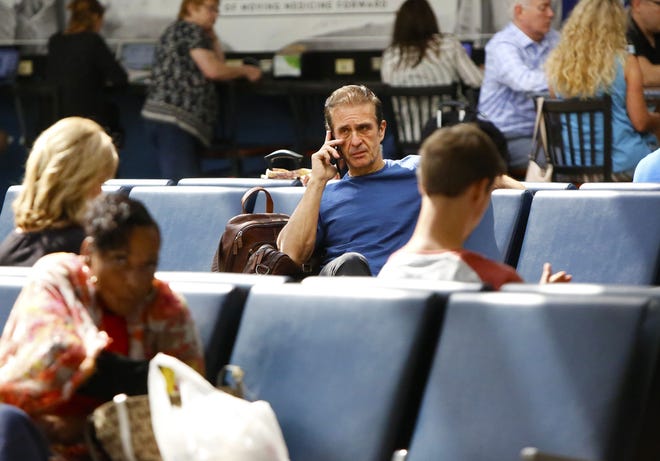 Passengers at the Gainesville Regional Airport sit in the airport terminal in October 2018. A study of passenger patterns at the airport released Thursday shows room for growth, although the airport has seen some successes in recent months, including new flights to Dallas. [File]